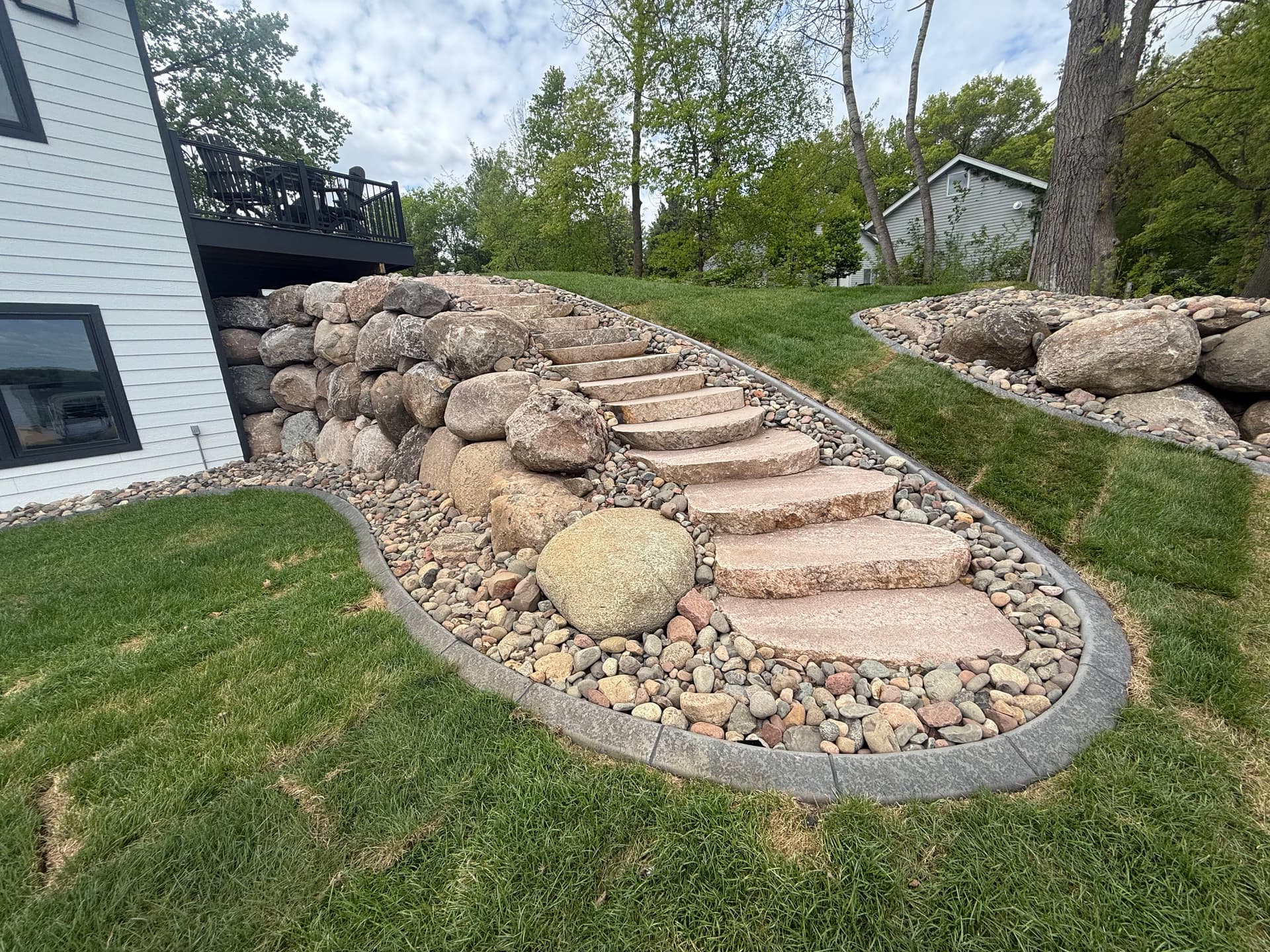 Natural Stone Retaining Walls and Steps That Actually Last image