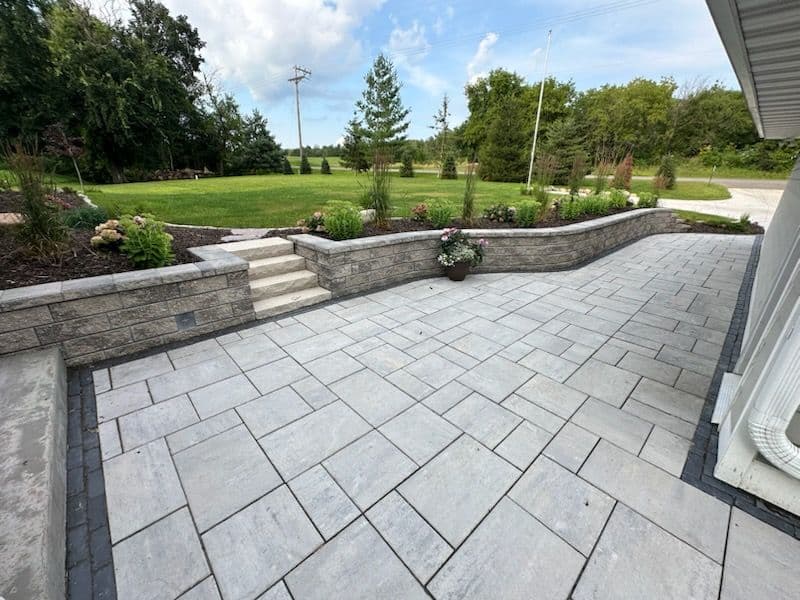 Paver Front Entryway with Retaining Wall and Natural Stone Steps